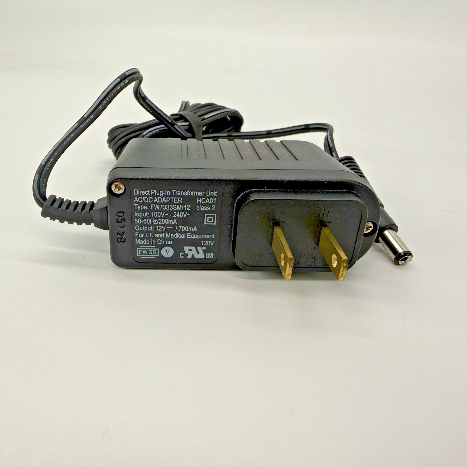 Direct Plug-In Transformer AC/DC Adapter HCA01 FW7333SM/12 Output: 12VDC 700mA