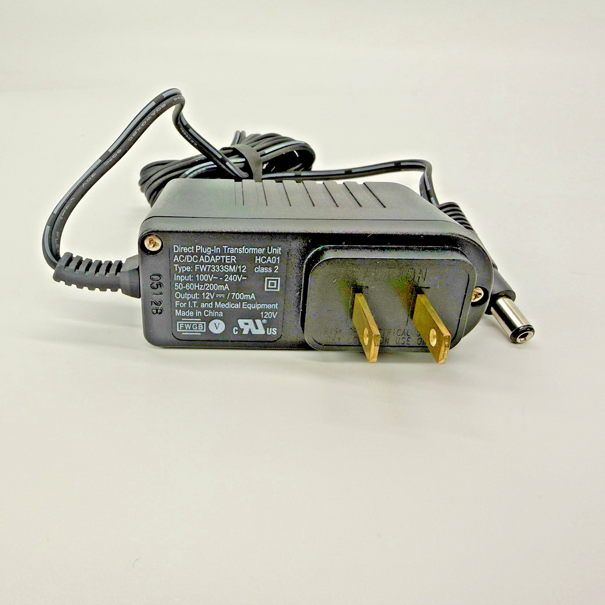 Direct Plug-In Transformer AC/DC Adapter HCA01 FW7333SM/12 Output: 12VDC 700mA